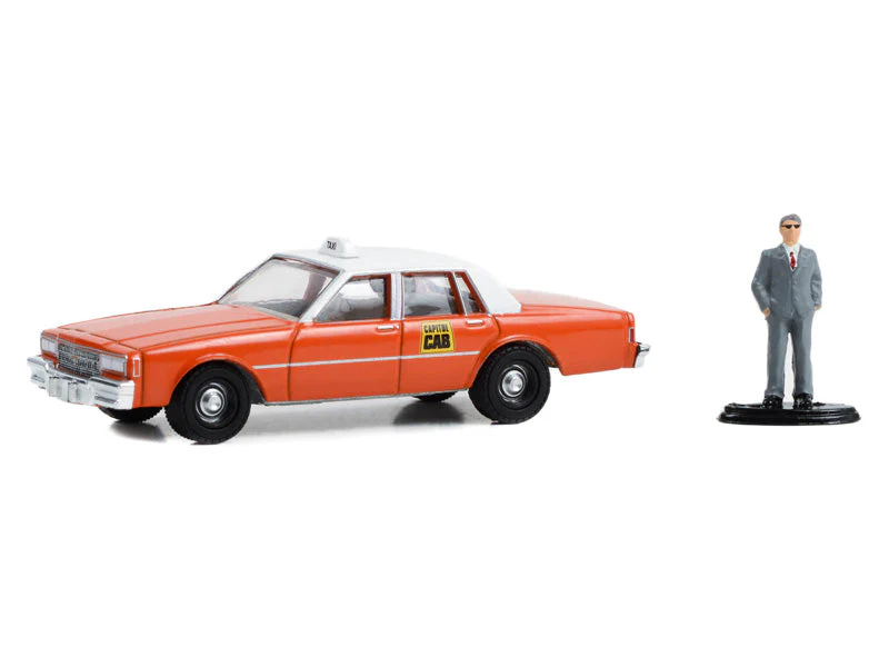 1981 Chevrolet Impala Capitol Cab Taxi w/ Man in Suit (The Hobby Shop Series 15) Diecast 1:64 Scale Model - Greenlight 97150B