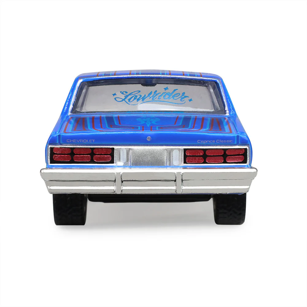 PRE-ORDER 1986 Chevrolet Caprice - Lowriders - Electric Blue – Sergio Rocha Collaboration Diecast 1:64 Scale Model - Greenlight 30598 - Image 3
